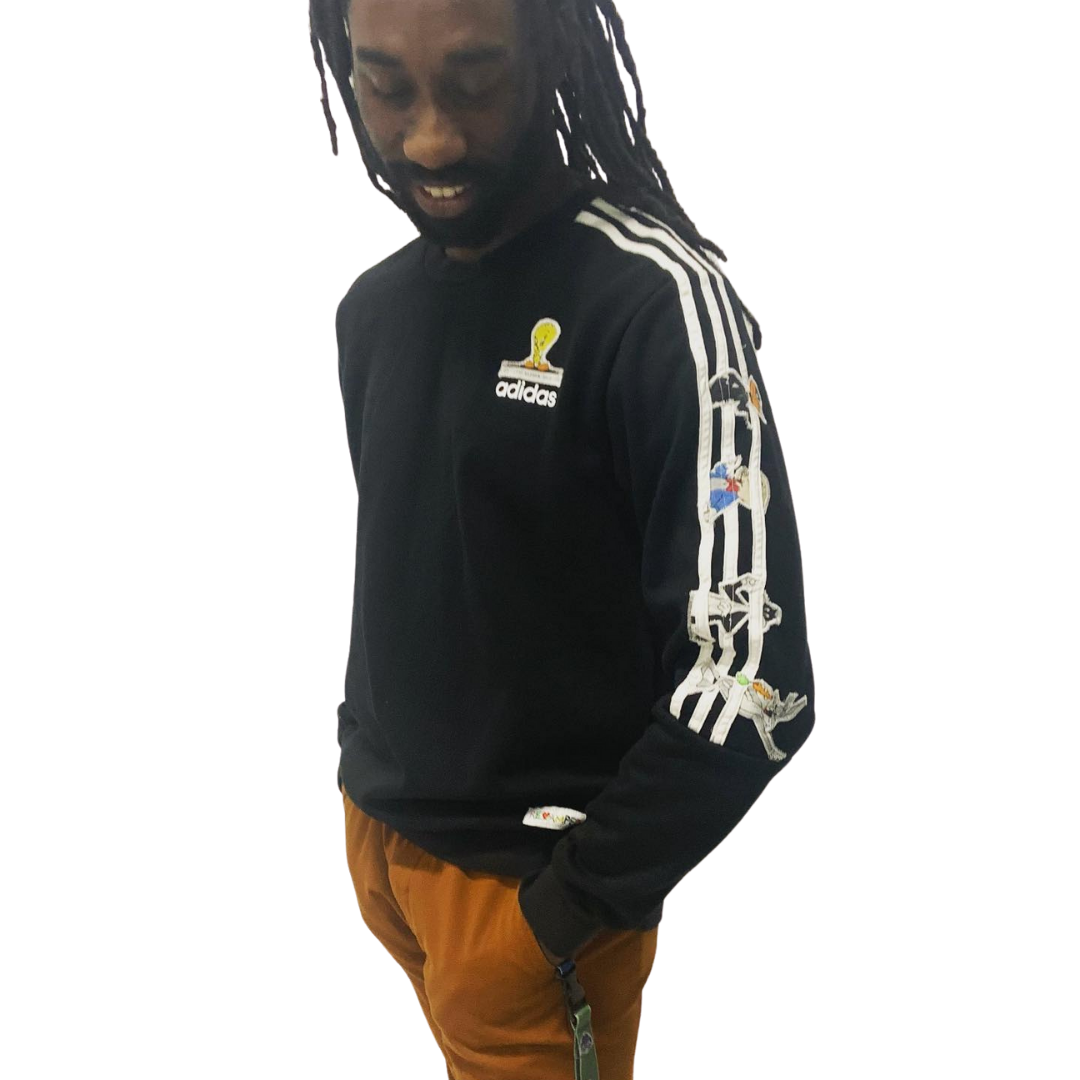 Revamped looney tunes/addidas pullover . Alterations available.