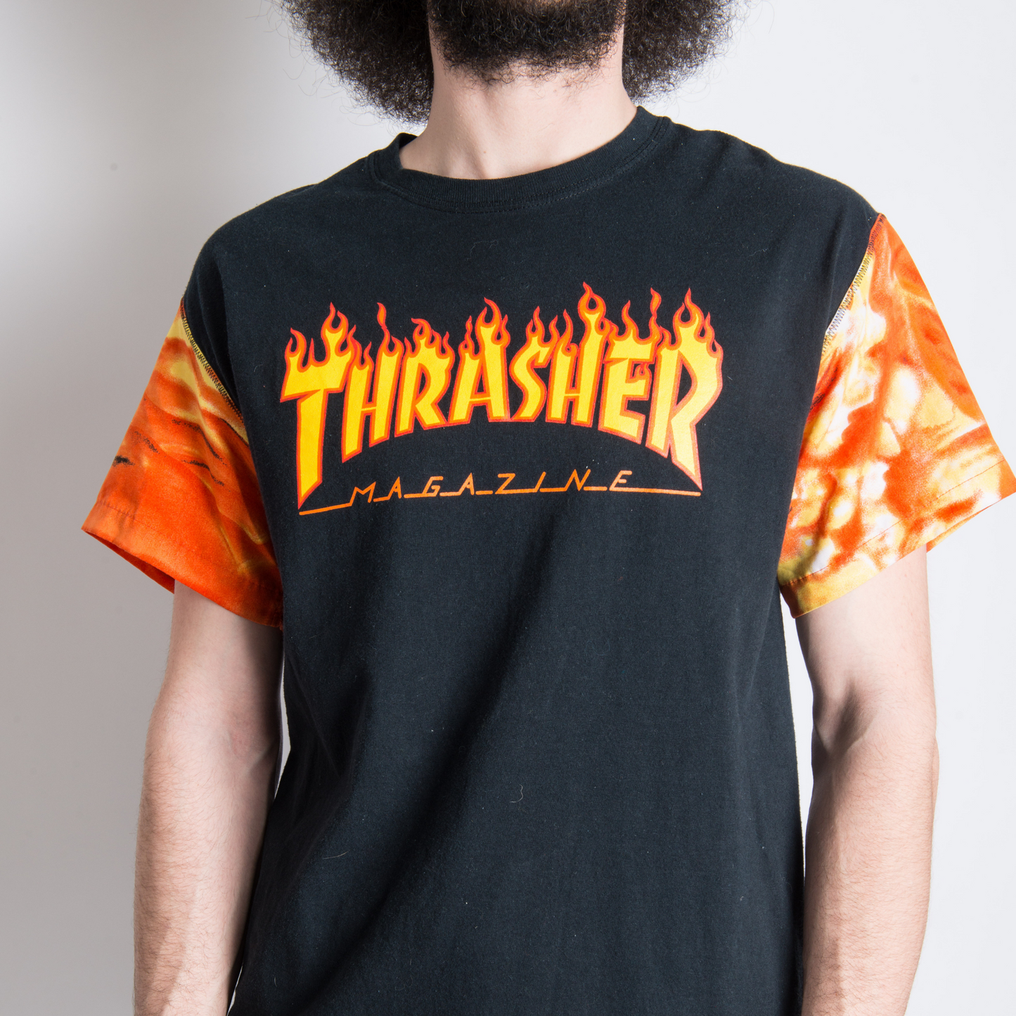 Black "THRASHER" T-SHIRT REVAMPED WITH VINTAGE SLEEVES. Alterations available.