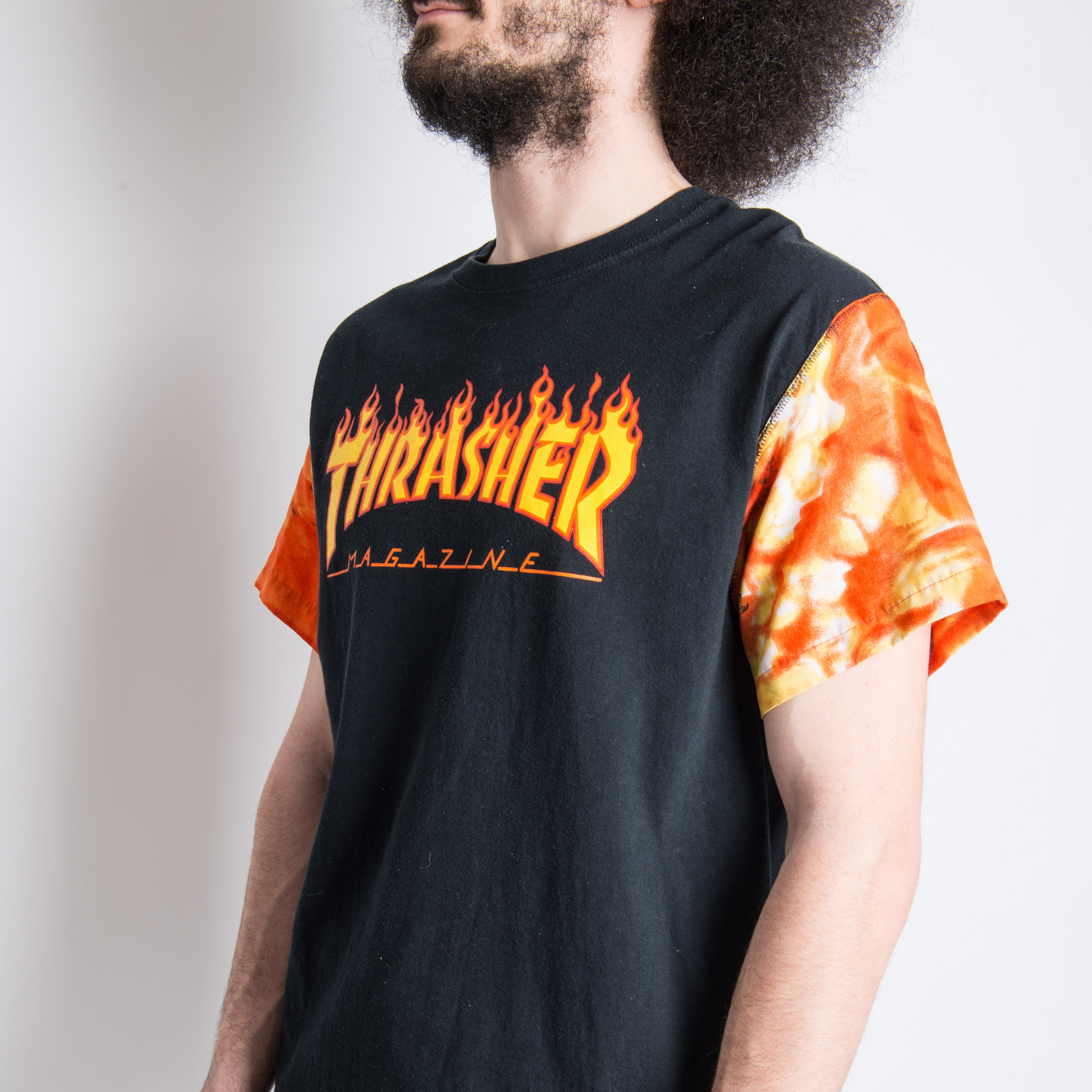 Black "THRASHER" T-SHIRT REVAMPED WITH VINTAGE SLEEVES. Alterations available.